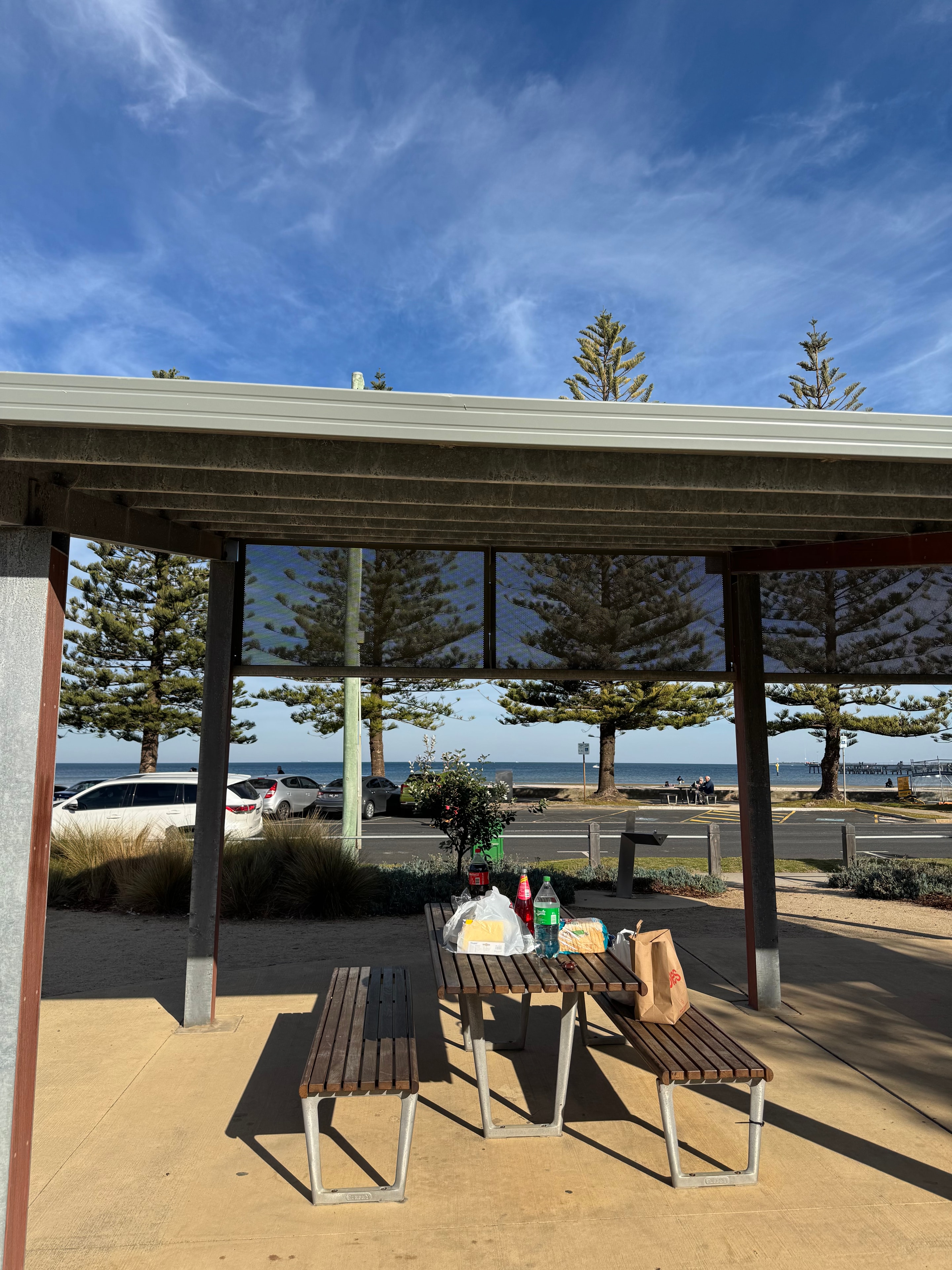 A group of participants with disability enjoying a community social activity together outdoors